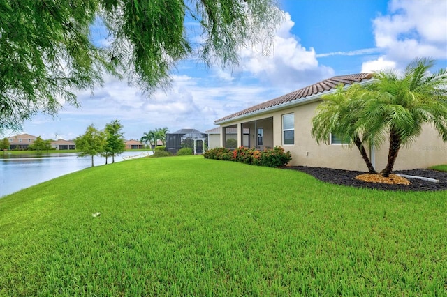 view of yard with a water view