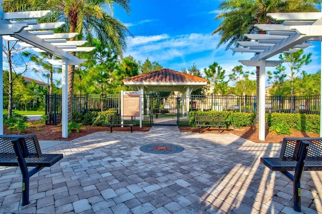 view of patio / terrace featuring fence and a pergola