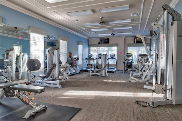 gym featuring carpet floors, visible vents, and crown molding