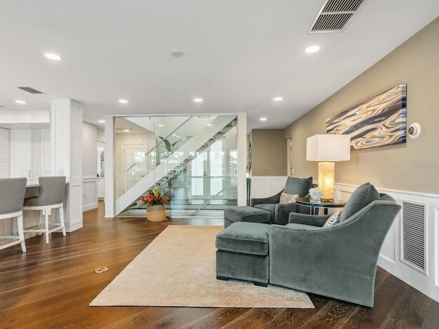 living room featuring dark hardwood / wood-style floors