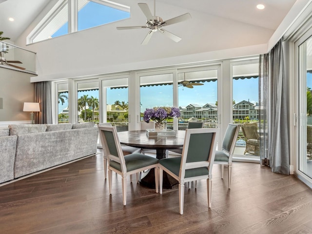 sunroom / solarium featuring ceiling fan and vaulted ceiling