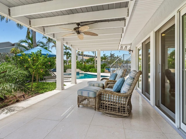 view of patio with ceiling fan