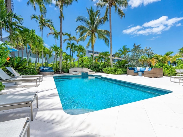 view of swimming pool with an outdoor hangout area and a patio area