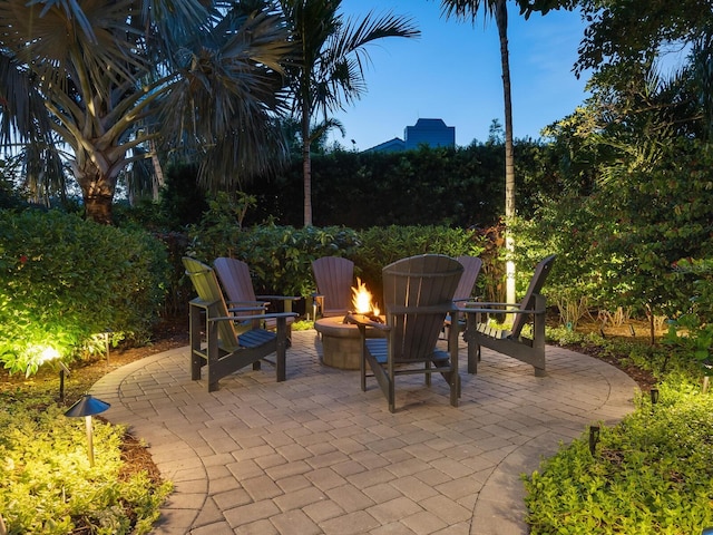 view of patio with a fire pit