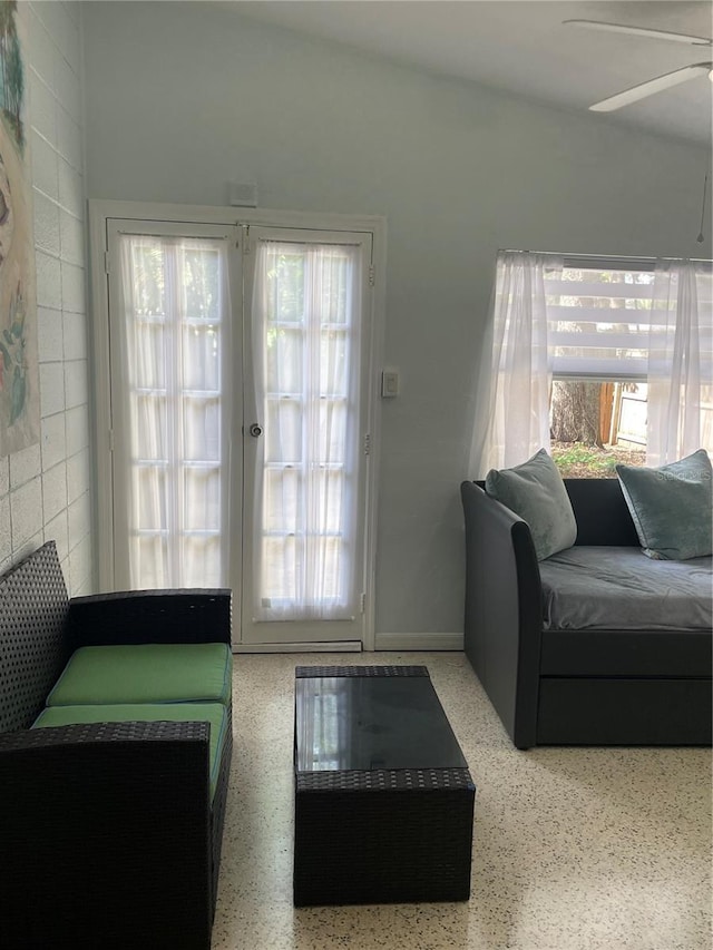 living room featuring ceiling fan