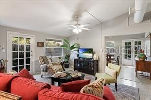 living room with vaulted ceiling and ceiling fan