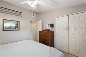 bedroom with a closet and ceiling fan