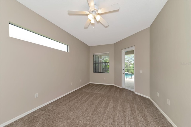 unfurnished room with carpet and ceiling fan