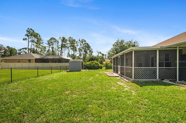 view of yard with a sunroom