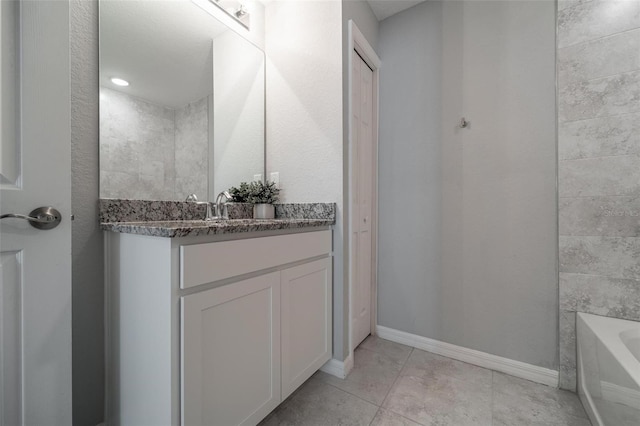 bathroom featuring vanity and tile patterned floors