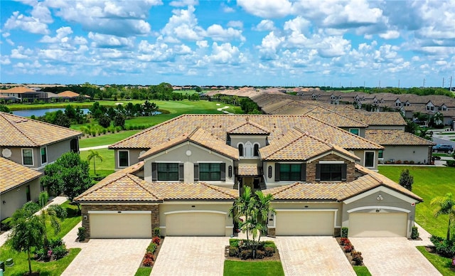 mediterranean / spanish-style house featuring a garage