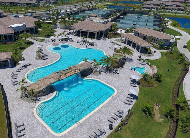 view of swimming pool featuring pool water feature