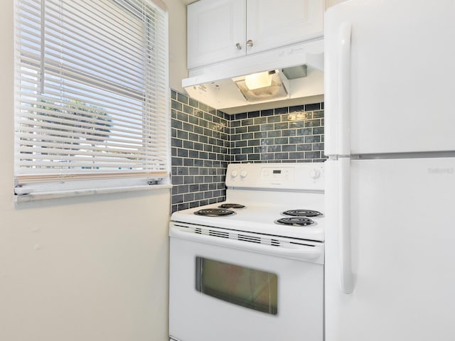 kitchen featuring white cabinetry, white appliances, and backsplash