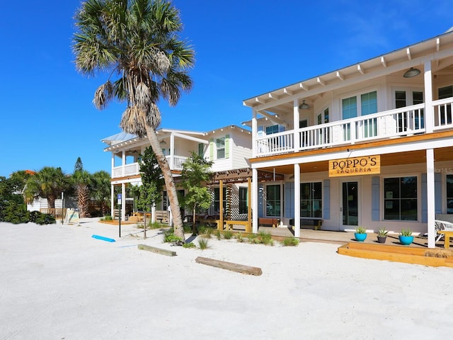 exterior space with a balcony