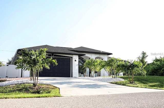 view of front of home with a garage