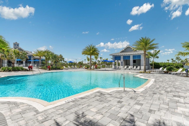 view of swimming pool with a patio area