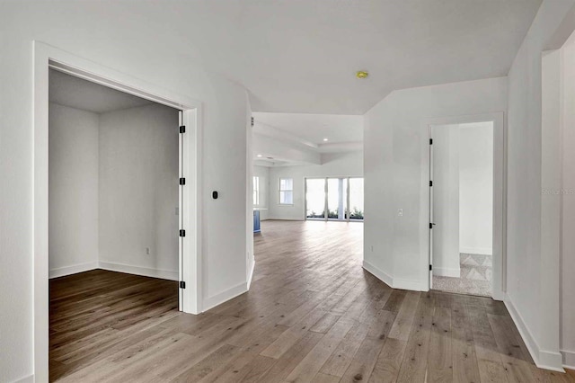 hallway featuring light hardwood / wood-style flooring