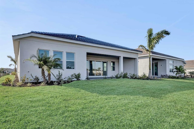 view of front of property with a front lawn