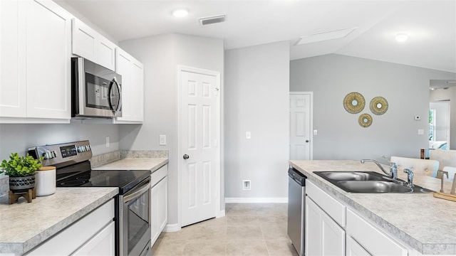 kitchen with white cabinetry, an island with sink, stainless steel appliances, and sink