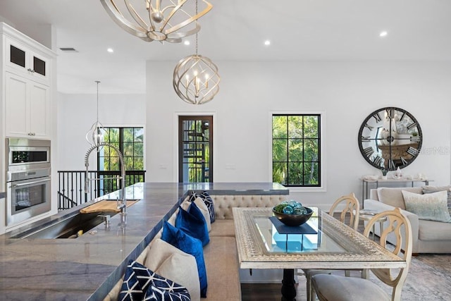 living room with a chandelier