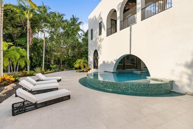 view of pool with a patio area