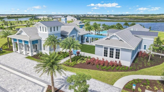 birds eye view of property featuring a water view