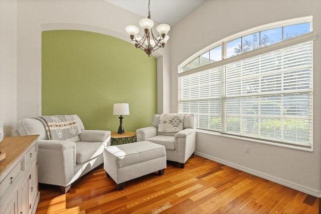 1206 86th Ct NW, Bradenton, FL 34209 - sitting room featuring a chandelier and light wood-type flooring