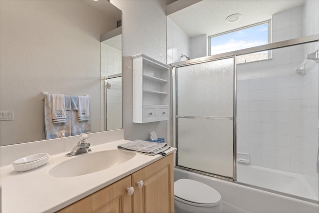 1206 86th Ct NW, Bradenton, FL 34209 - full bathroom featuring vanity, combined bath / shower with glass door, and a textured wall