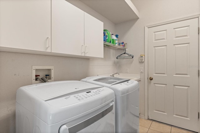 1206 86th Ct NW, Bradenton, FL 34209 - laundry area featuring cabinet space and independent washer and dryer