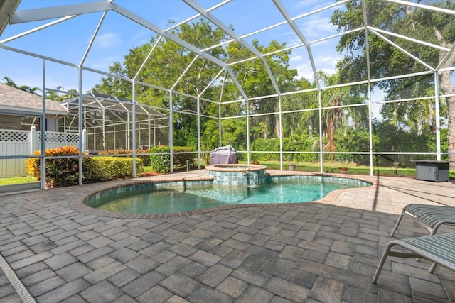1206 86th Ct NW, Bradenton, FL 34209 - view of pool featuring a patio, a lanai, and a pool with connected hot tub
