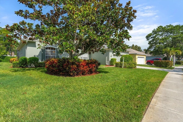 1206 86th Ct NW, Bradenton, FL 34209 - view of front of property featuring driveway, stucco siding, and a front lawn