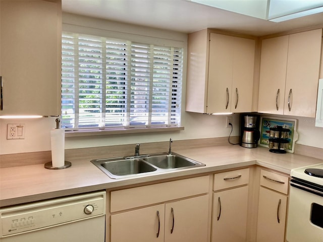 kitchen with white appliances and sink