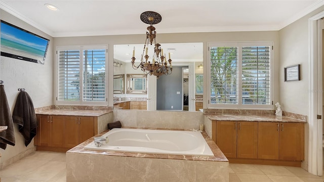 bathroom featuring crown molding, vanity, an inviting chandelier, and tiled bath