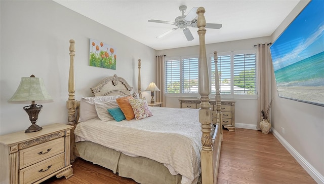 bedroom featuring wood-type flooring and ceiling fan