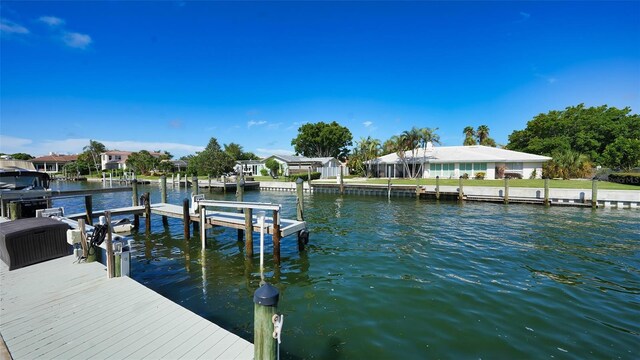 view of dock with a water view