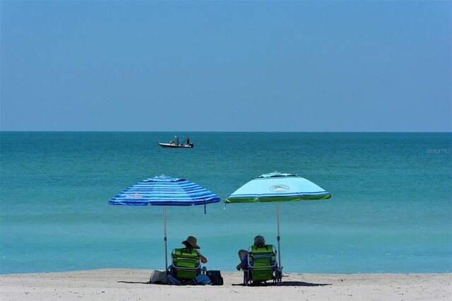 view of water feature with a beach view