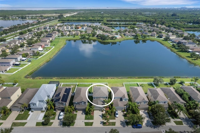 bird's eye view with a water view