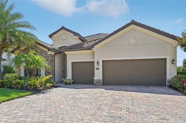 view of front of property featuring a garage