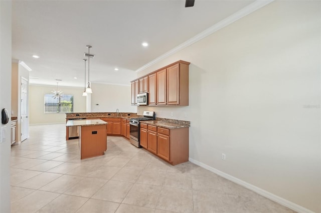 kitchen featuring hanging light fixtures, stainless steel appliances, ornamental molding, light tile patterned flooring, and kitchen peninsula