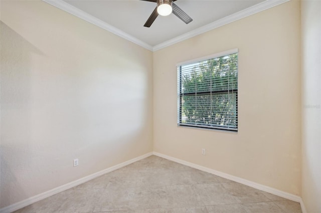 spare room with crown molding and ceiling fan