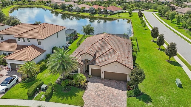 bird's eye view with a water view