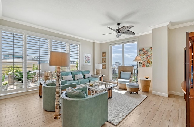 living room featuring light hardwood / wood-style flooring, ceiling fan, and ornamental molding