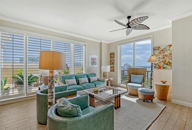 living room with light hardwood / wood-style floors, crown molding, and ceiling fan