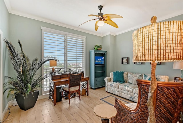 home office with ornamental molding, light hardwood / wood-style floors, and ceiling fan