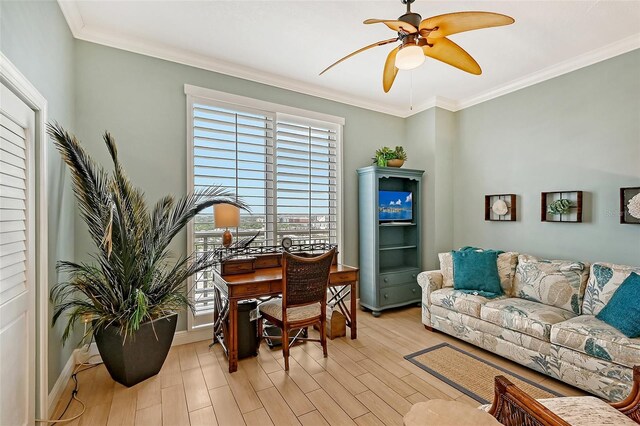 living room featuring ceiling fan, light hardwood / wood-style floors, and ornamental molding