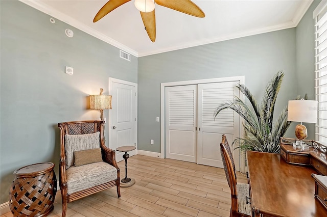 office space with crown molding and ceiling fan