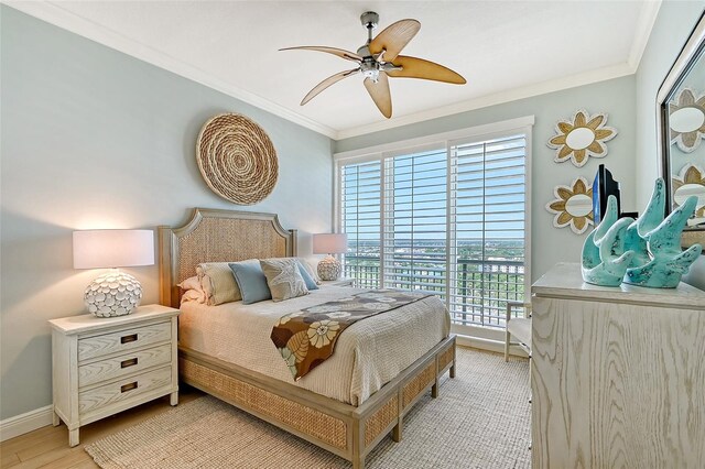 bedroom featuring access to exterior, crown molding, ceiling fan, and light hardwood / wood-style floors