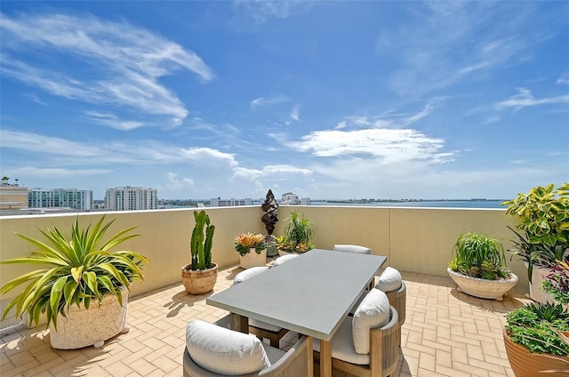 view of patio / terrace featuring a water view