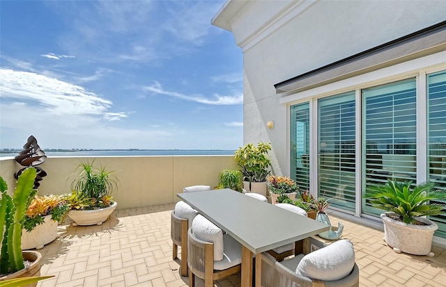 view of patio / terrace featuring a water view