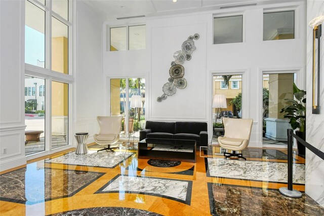 living room with a high ceiling